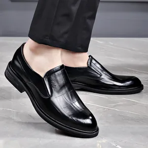 Classic black embossed leather men's dress shoes in a slip-on pointed toe style.