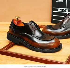 Polished dark brown leather men's round toe Derby shoes with a vintage burnished finish