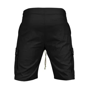 Rear view of black men's cargo shorts with functional pockets and drawstring detail.