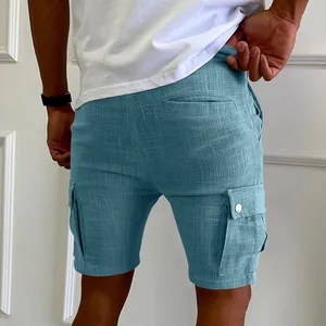 Detailed view of the blue linen-like textured fabric on these men's slim fit cargo shorts