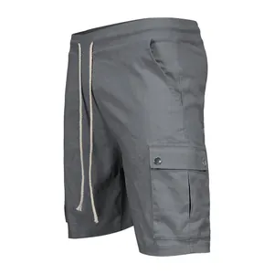 Detailed side view of grey men's cargo shorts with drawstring and flap pockets