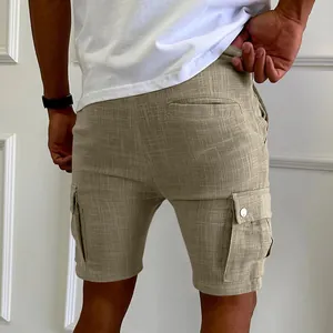 Macro detail view of men's slim fit khaki cargo shorts with textured linen fabric