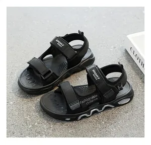 Detail showing black boys' sport sandals with adjustable straps and soft sole