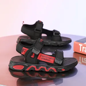 Lightweight boys' black and red sandals with soft soles and velcro straps for beach