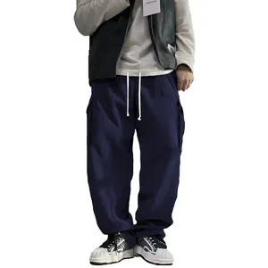 Detailed view of men's retro corduroy cargo pants with a loose straight leg fit.