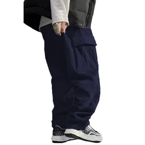 Side view detail of navy blue corduroy cargo pants with loose straight leg fit