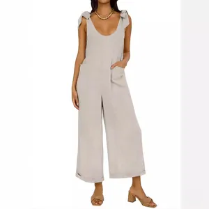 Chic sleeveless light grey wide-leg jumpsuit with U-neck and tie-shoulder details