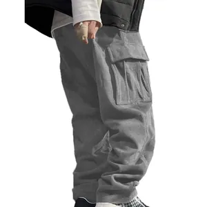 Detailed view of grey corduroy cargo pants with side pockets and retro loose fit