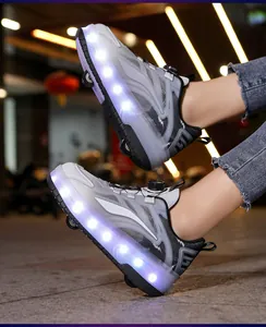 Close-up of kids LED roller shoes with double wheels and rotating buckle in night setting