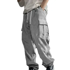 Detailed side view of grey corduroy cargo pants with large side pockets for men.