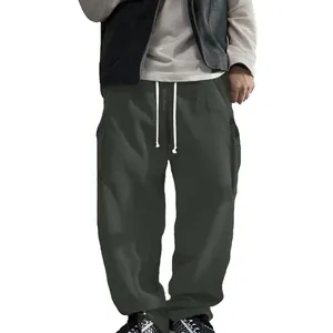 Detailed macro view of dark grey corduroy cargo pants with white drawstrings