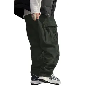 Detailed view of dark green corduroy cargo pants with large side flap pockets