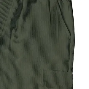Close-up detail showing the ribbed olive green corduroy fabric and side cargo pocket