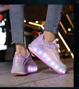 Side view of pink and purple LED roller shoes for kids with swivel buckle lace