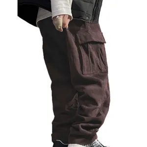 Detailed view of men's brown corduroy cargo pants featuring a large side pocket and texture.