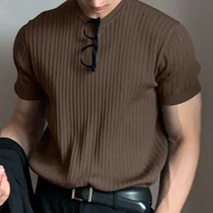 Detailed view of men's brown ribbed short-sleeved knit t-shirt with crew neck design