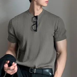 Detailed view of grey ribbed knit short-sleeved T-shirt for men with round neck.