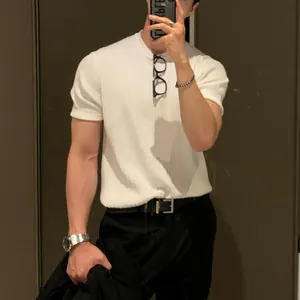 Detailed view of white men's short sleeve knitted T-shirt with vertical ribbed texture