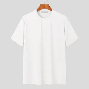 Close-up of white short-sleeved ribbed knit t-shirt with round neck
