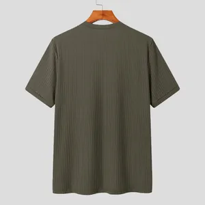 Back view of a men's olive green ribbed knit short sleeve T-shirt with texture detail