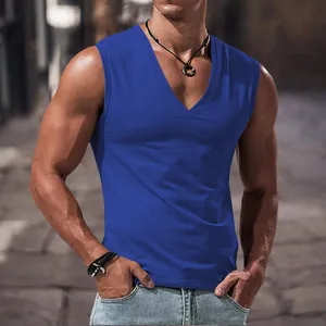 Detail showing the fit of blue V-neck sleeveless tank top on a model in street style