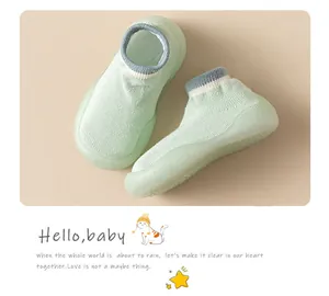 Soft breathable mint green baby walking shoes with flexible rubber soles for indoor use.