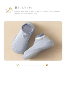 Breathable light blue baby sock shoes with flexible soft rubber soles for indoor walking