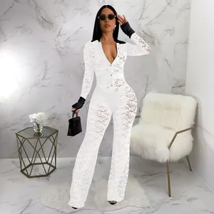 Detailed view of the delicate floral lace texture on the white contrast jumpsuit