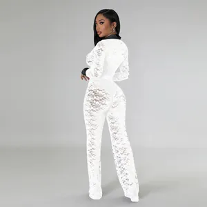 Elegant white floral lace jumpsuit with black contrast collar showing a fitted back view look