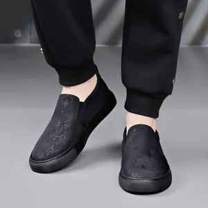 Casual men's slip-on sneakers with star pattern, breathable mesh loafers in black