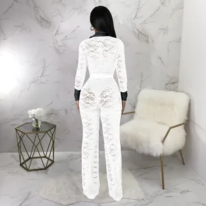 Rear view of a elegant white floral lace jumpsuit with black contrast trim detail
