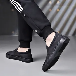 Stylish men's black breathable mesh slip-on casual loafers with subtle star print detail