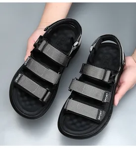 Detailed view of men's sports sandals featuring durable grey woven straps and buckles