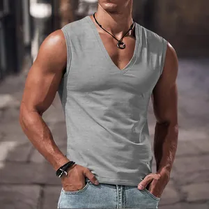 Detail of a men's grey V-neck vest in a soft cotton fabric for a casual summer style.