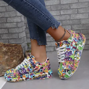 Detailed view of colorful graffiti print platform sneakers with sturdy white laces
