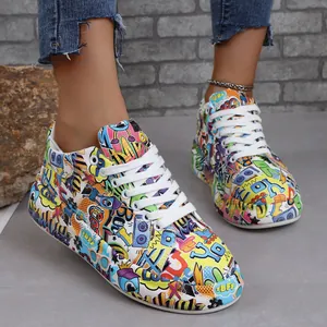 Close-up of vibrant graffiti-print platform sneakers with colorful urban art design
