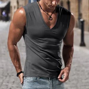 Detailed view of a slim fit charcoal grey V-neck tank top on a male model in a street