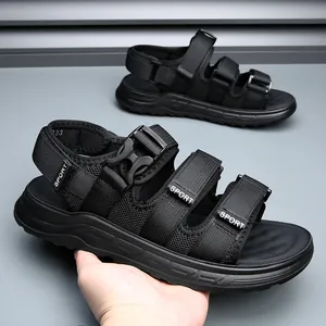 Close-up of black men's sports sandals with adjustable straps and buckles