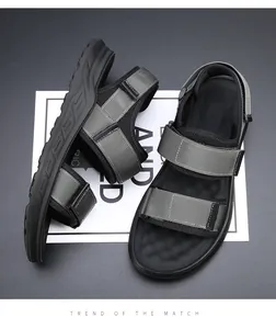 Top view detail of men's non-slip casual beach sandals with grey webbing straps