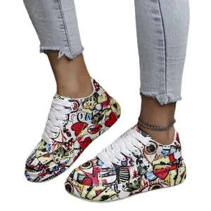 Fashionable graffiti painted chunky sneakers for women featuring colorful pop art patterns