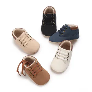 Group of colorful infant soft sole walking shoes for baby boys in a clean layout.