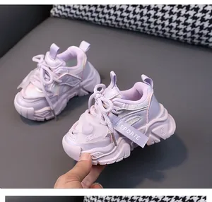 Detail view of lavender mesh toddler sneakers with a cute heart charm and soft sole.