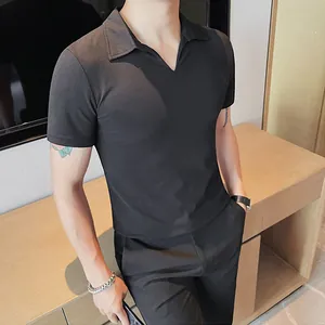 Close-up of a men's slim-fit black short-sleeve Polo shirt with a V-neck lapel design.