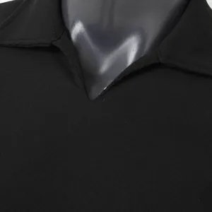 Close-up of black breathable mesh fabric on men's slim fit V-neck polo shirt