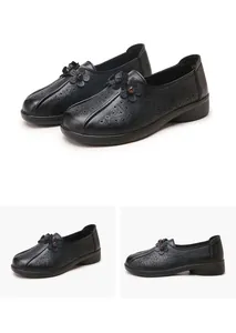 Detailed views of black hollow-out leather flat shoes for women from multiple angles
