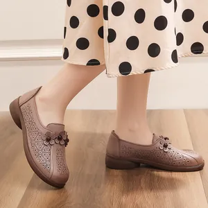 Comfortable leather hollow-out flat shoes with decorative flowers for elderly women