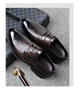 Macro detail of dark brown perforated leather business dress shoes with lace-up style
