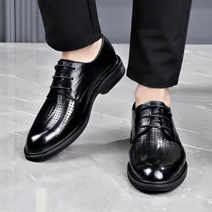 Men's breathable hollow leather business dress shoes with lace-up formal style design.
