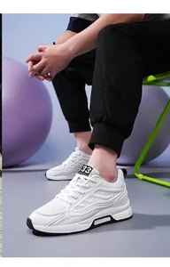Detailed close-up view of breathable white mesh men's running shoes with height boost