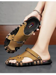 Detailed view of men's brown casual beach sandals with non-slip thick black soles